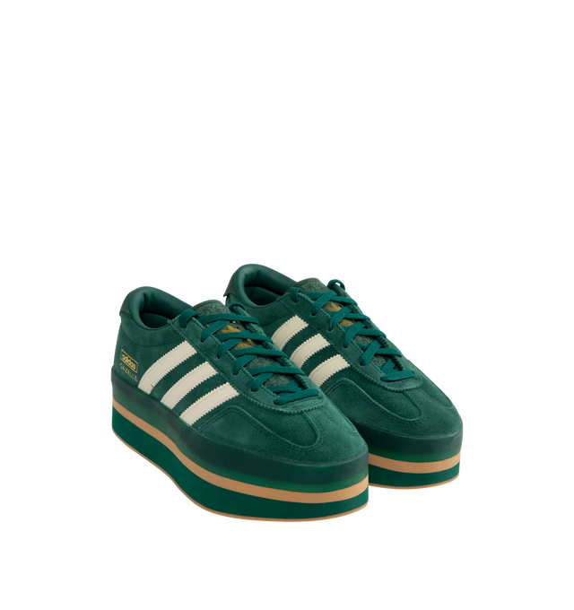 Image 2 of 5 - GREEN - Adidas Gazelle Stack lace-up platform sneakers featuring layers of moulded EVA in the midsole for an ultra-high platform, ssmooth leather upper, suede accents and semi-translucent foxing tape add retro appeal. 