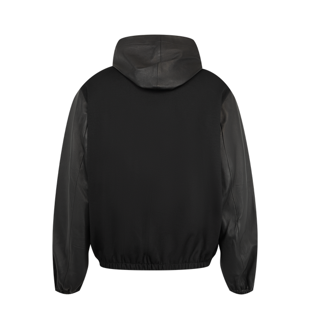 Image 2 of 3 - BLACK - Wales Bonner Men's Vista Leather Anorak is crafted from soft plong leather and technical twill and features a relaxed silhouette in a black and ivory colorway. Inspired by ceremonial dress, the design is detailed with a contrasting sash-style panel across the front, a drawstring hood, and a two-way zip closure. Finished with zip seam pockets, elasticized cuffs and hem, dropped shoulders, and an embossed logo at the chest. 68% Polyester, 18% Polyacrylic, 12% Rayon, 2% Polyurethane. Con 