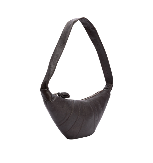 Image 2 of 3 - BROWN - LEMAIRE Medium Croissant Bag featuring side knot finishings, embossed logo inside, lining in cotton canvas, metal looped zip puller, interior patch pocket and main compartment. 19 in x 9 in x 3 in. 100% lamb. Made in Spain. 