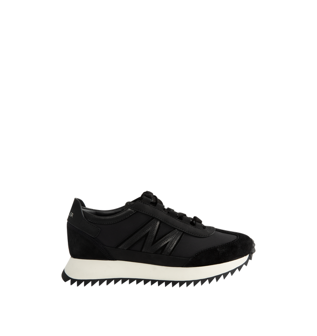 Image 1 of 5 - BLACK - Moncler Womens Pacey2 Sneakers feature a nylon, suede, and nubuck upper. Designed with a lace-up closure, mesh lining, padded construction, leather detailing, signature monogram accent, and TR outsole. Upper: Cow Leather and 100% Polyamide/Nylon; Lining: Cow Leather; Sole: 100% Elastodiene. Sole Height: 3.2 cm. Made in Vietnam. 