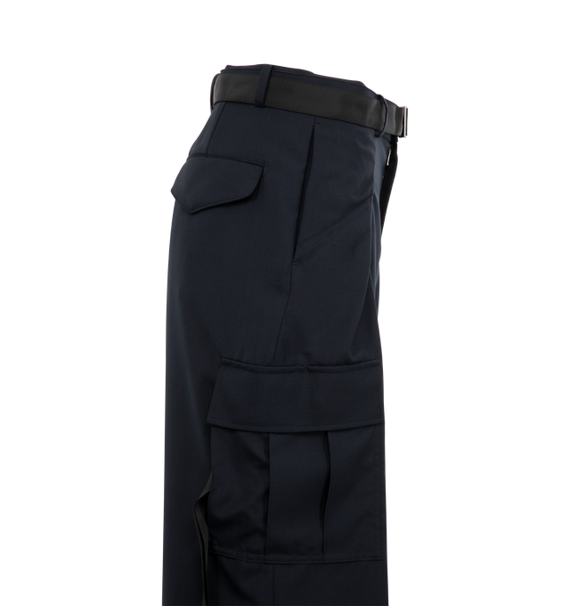 Image 3 of 3 - NAVY - SACAI Suiting Pants featuring adjustable belted waist, high rise, side slip pockets, back flap pockets and cargo flap pockets. Made in Japan. 