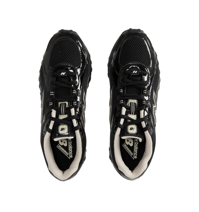 Image 5 of 5 - BLACK - NEW BALANCE 204L Sneaker featuring multi-piece upper with embossed overlay, screen-printed graphics along the saddle, distinctive outsole with 2000s-inspired strike path and 70s-influenced tread pattern, double-stacked synthetic leather and reflective 'N' logo, patent leather and mesh upper and EVA outsole. 