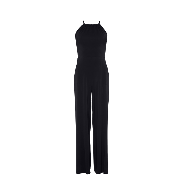 Image 1 of 5 - BLACK - ERES Donna Jumpsuit featuring sliding and twisted link to tie around the neck, adjustable straps crossed in the back, high neckline with shirring, open back and two side pockets. 94% Polyamid, 6% Spandex. Made in France.  