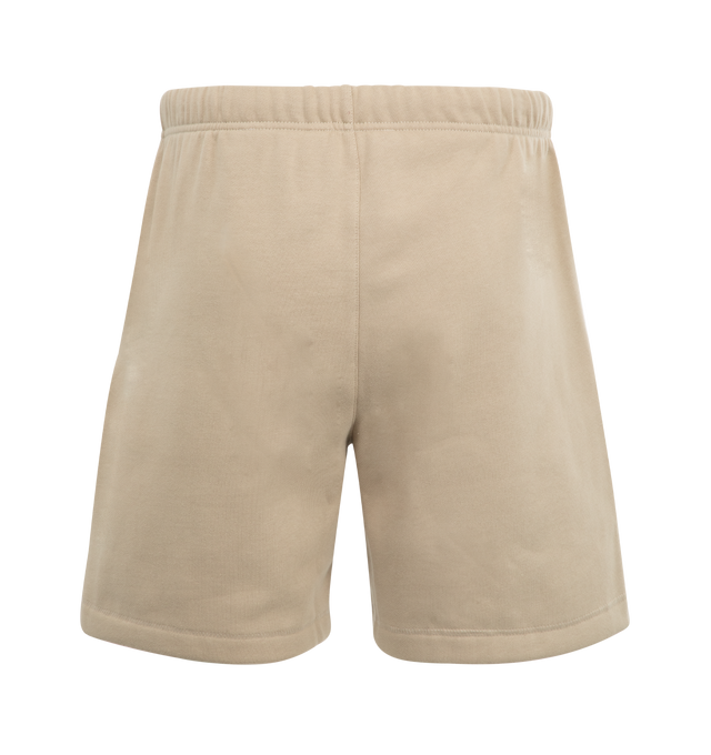 Image 2 of 3 - NEUTRAL - FEAR OF GOD Soccer Fleece Shorts featuring side pockets, elastic waistband with drawstring and logo details. 80% cotton, 20% polyester. 