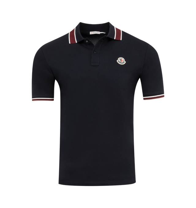 Image 1 of 2 - NAVY - MONCLER Logo Polo featuring cotton piquet, collar, button placket closure, short sleeves and felt logo patch. 100% cotton. 