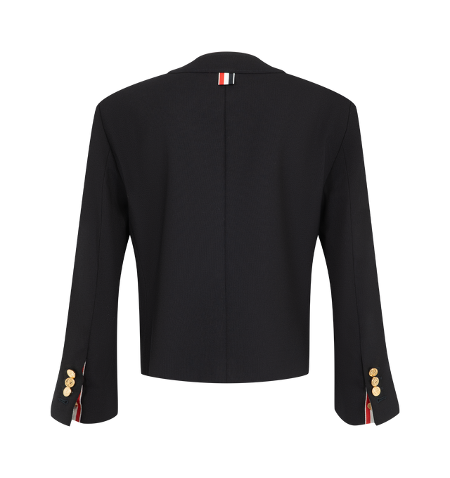 Image 2 of 3 - NAVY - Thom Browne Women's Hopsack Suiting Cardigan Jacket is crafted from open-weave virgin wool hopsack suiting and reinterprets classic tailoring through a relaxed, cardigan-inspired silhouette. Designed with a V-neckline, the jacket features an anchor-detailed button closure with a signature RWB grosgrain placket, buttoned welt hand pockets, and two interior pockets. Buttoned cuffs reveal internal RWB grosgrain trim, while a tricolor silk lining and Thom Browne's signature striped grosgra 