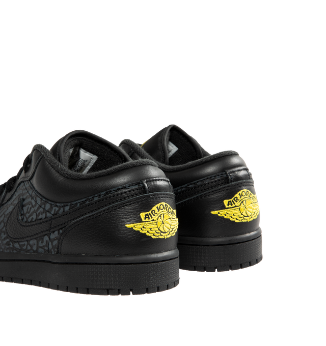 Image 3 of 5 - BLACK - JORDAN Air Jordan 1 Low SE Sneaker featuring lace up, encapsulated Air-Sole unit, lightweight cushioning, genuine leather in the upper and solid rubber outsole. 