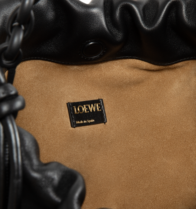 Image 3 of 3 - BLACK - LOEWE Large Flamenco Purse featuring shoulder, crossbody or hand carry, detachable and adjustable leather strap, detachable donut chain adorned with an Anagram Pebble, discreet magnetic closure, suede lining and gold embossed LOEWE. 10.2 x 16.1 x 3.5 inches. Mellow nappa lambskin. 