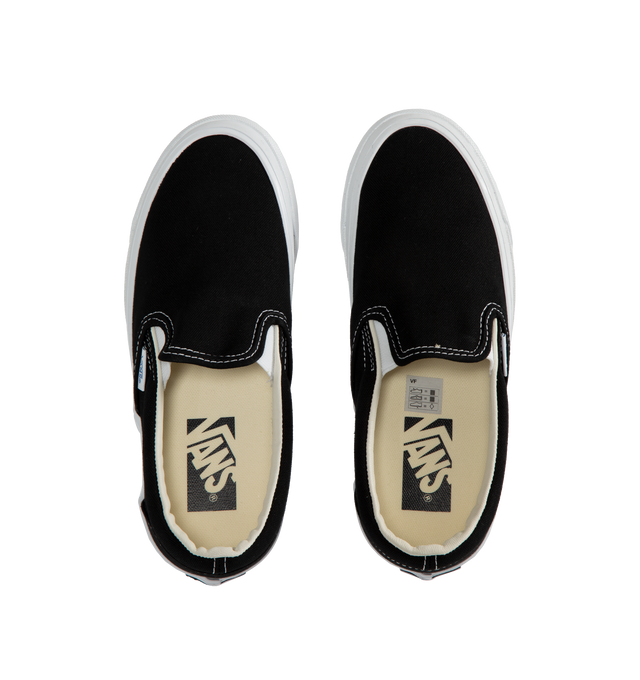 Image 5 of 5 - BLACK - VANS U Slip-On Reissue 98 Sneaker featuring padded collar and stretch gore for added comfort, round toe, slip on, lower collar around the ankle and higher collar above the heel. Canvas upper and lining, rubber sole. 