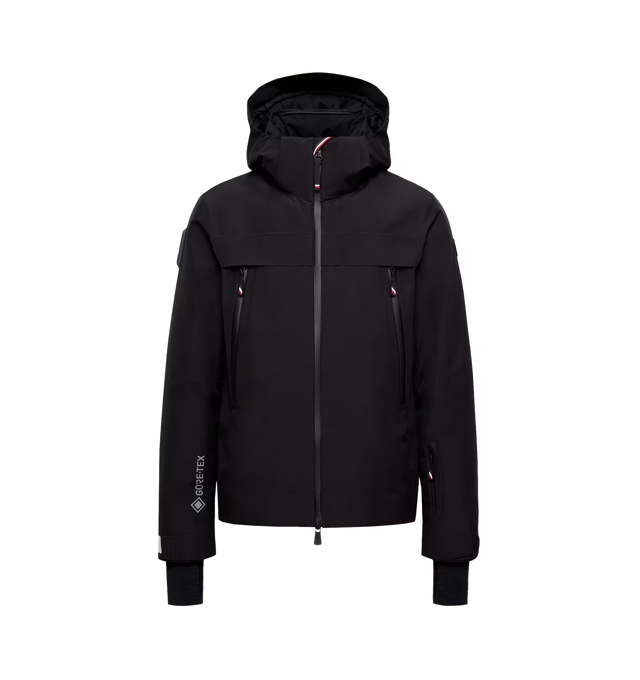 Image 1 of 1 - BLACK - Moncler Grenoble Men's Balmhorn Insulated Ski Jacket is crafted from 2L GORE-TEX technical fabric and features a quilted down-filled construction, heat-sealed seams, and a removable hood with visor. Designed for skiing and snowboarding, this performance outerwear style is equipped with YKK AquaGuard NATULON water-repellent zip closures, a powder skirt, adjustable cuffs, an internal electronics pocket, and an integrated RECCO reflector for added mountain safety. Main Material: 100% Pol 