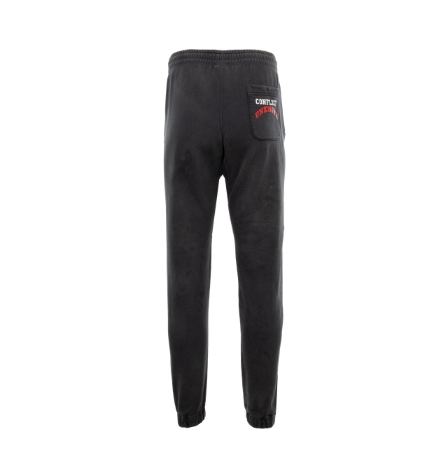 Image 2 of 4 - BLACK - SAINT MICHAEL Denim Tears Struggle Sweatpants featuring vintage treatment, side pockets and back pocket, elastic waist with drawstrings and no side seam. 100% cotton. 