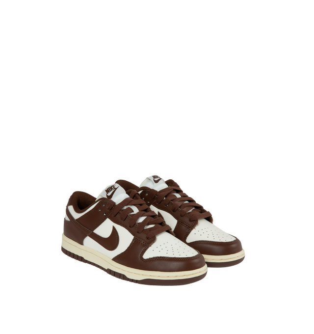 Image 2 of 5 - BROWN - NIKE Dunk Low LX Sneaker featuring lace-up front, signature Swooshes at sides, embossed Air logo at foxing, perforated toe and padded collar with debossed Nike logo at back counter. 
