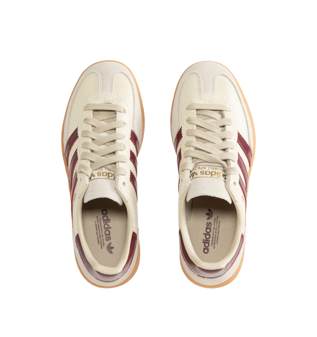 Image 5 of 5 - NEUTRAL - Adidas Men's Handball Spezial Sneakers feature a textured mix of cracked leather, suede overlays, and patent leather 3-Stripes. Designed in a regular fit with a secure lace-up closure, these designer sneakers feature signature Spezial detailing at the quarter and tongue and a soft gum rubber outsole. Upper: Leather. Lining and Insole: Textile and Other Materials. Outsole: Other Materials.  