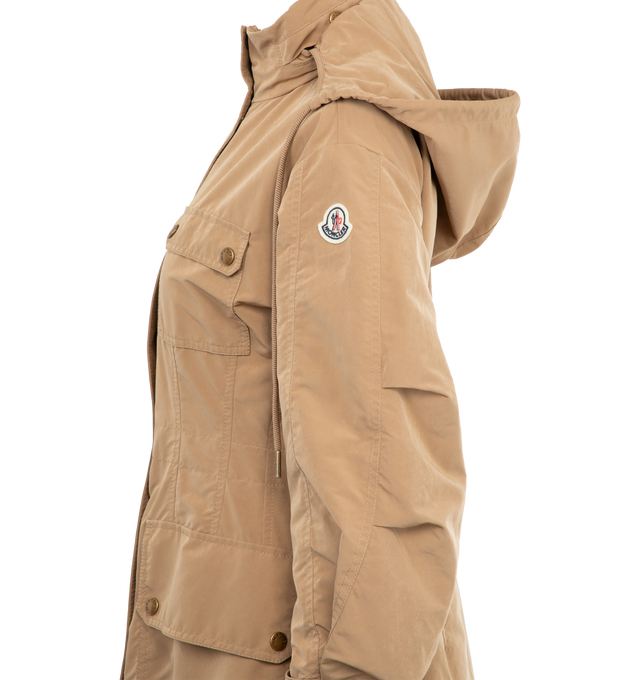 Image 3 of 3 - BROWN - MONCLER Nantes Parka featuring a polyester and nylon blend, micro mesh lining, pull-out adjustable hood, three-quarter length sleeves, zip and snap button closure, waist with inner drawstring fastening and patch pockets. 70% polyester, 30% polyamide/nylon. Made in Romania. 