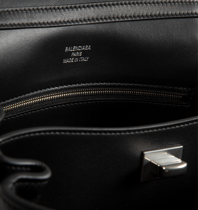 Image 3 of 3 - BLACK - Balenciaga Rodeo Small Handbag has a magnetic closure, a top carry handle, a removable shoulder strap, a removable leather keyring, and aged silver hardware. 100% calfskin. Made in Italy.  