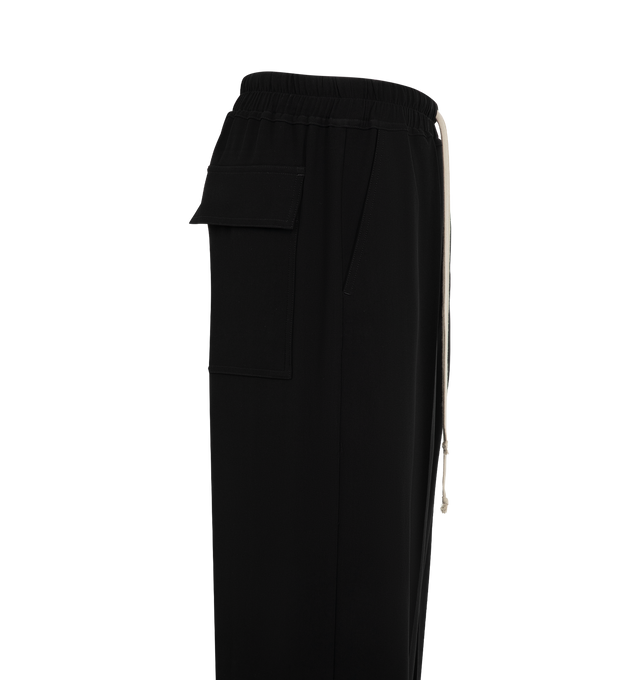 Image 3 of 3 - BLACK - Rick Owens Womens Dietrich Drawstring Pants are crafted from medium weight cotton poplin with a crisp washed finish. Feature a loose straight-leg silhouette, elasticized drawstring waistband, stitched fly, side seam pockets, and two rear flap patch pockets. Main Material: 97% Cotton, 3% Elastane; Buttons: 100% Buffalo Horn. Made in Italy. 
