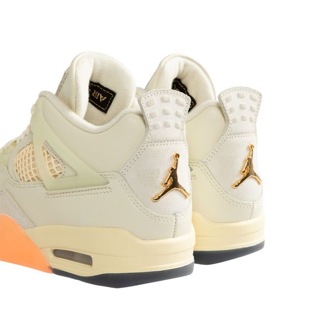 Image 3 of 5 - NEUTRAL - Women's Air Jordan 4 Retro Sneakers feature a smooth leather upper with mesh underlays, nubuck suede overlays, and a high-top silhouette inspired by a tropical color palette. These lifestyle sneakers combine a visible Air-Sole unit, a polyurethane midsole, and a durable rubber outsole for responsive cushioning, lasting comfort, and reliable traction. Main Material: Genuine Leather and Nubuck Suede. Midsole: Polyurethane with Visible Air-Sole Unit. Sole: Rubber. 
