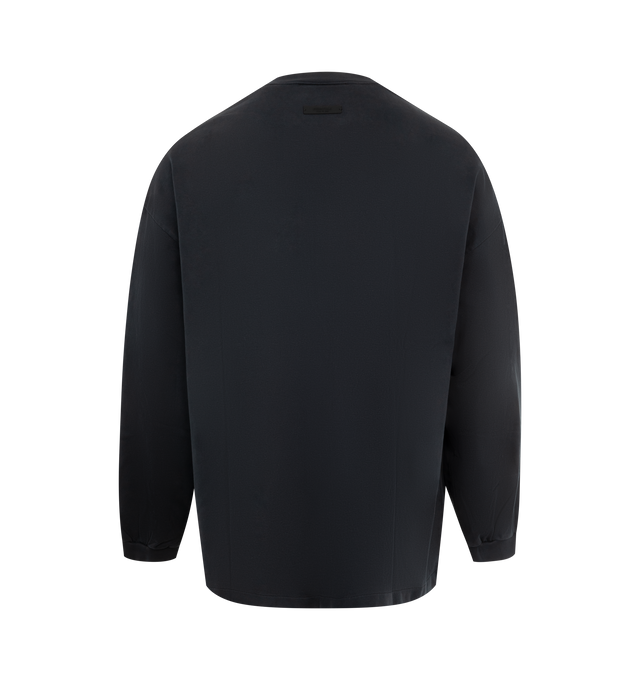 Image 2 of 2 - BLACK - Fear of God Essentials Heavy State Long Sleeve T-Shirt has a crew neck, an oversized fit, and brand label and graphics. 100% cotton.  