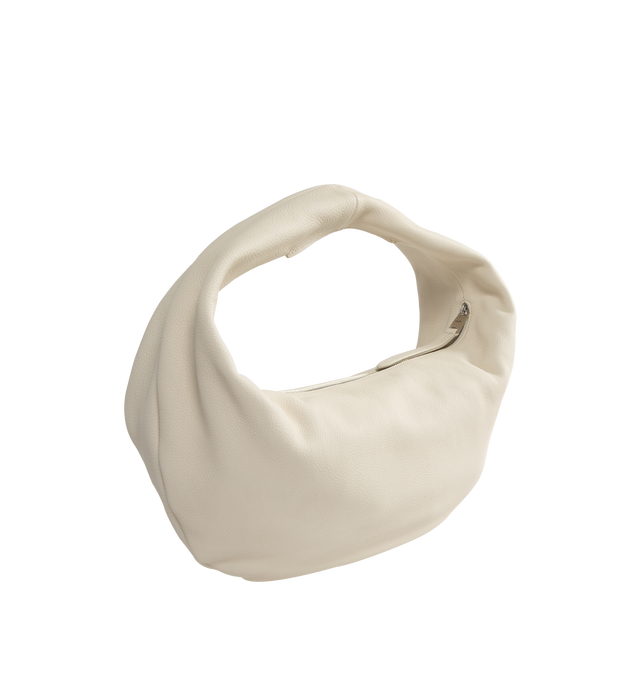 Image 2 of 3 - WHITE - Khaite slouchy zip-top hobo bag in richly textured leather. Slip pocket at interior. With integrated strap to wear over the shoulder or carry by hand. Measures: length: 16 in x width 7 in x height 9.4 in x handle drop: 9 in. 