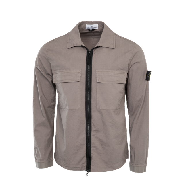 GREY - STONE ISLAND Zip-Up Overshirt featuring regular fit, two patch breast pockets with flap, Stone Island badge on the left sleeve, adjustable snap at cuffs and two-way zipper closure. 98% cotton, 2% elastane/spandex.