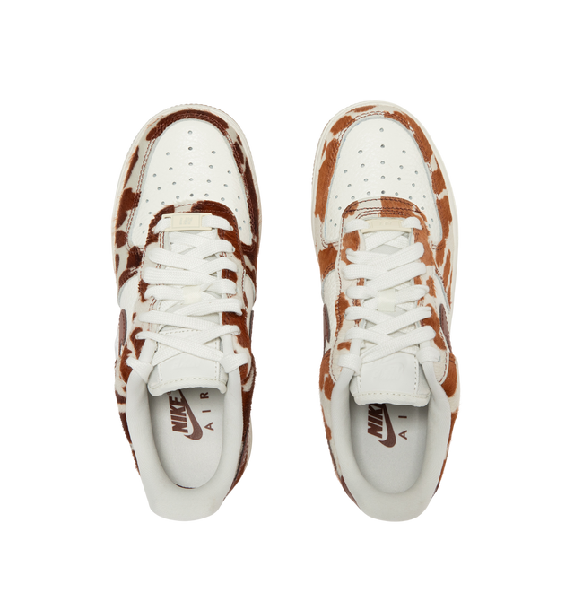 Image 5 of 5 - BROWN - Nike Womens Air Force 1 Sneakers are crafted from pony hair leather with smooth leather overlays. Feature a low-top silhouette, Nike Air cushioning, padded collar, stitched overlays, and a durable rubber cupsole. Main Material: Pony Hair Leather, Leather; Outsole: Rubber. Imported. 