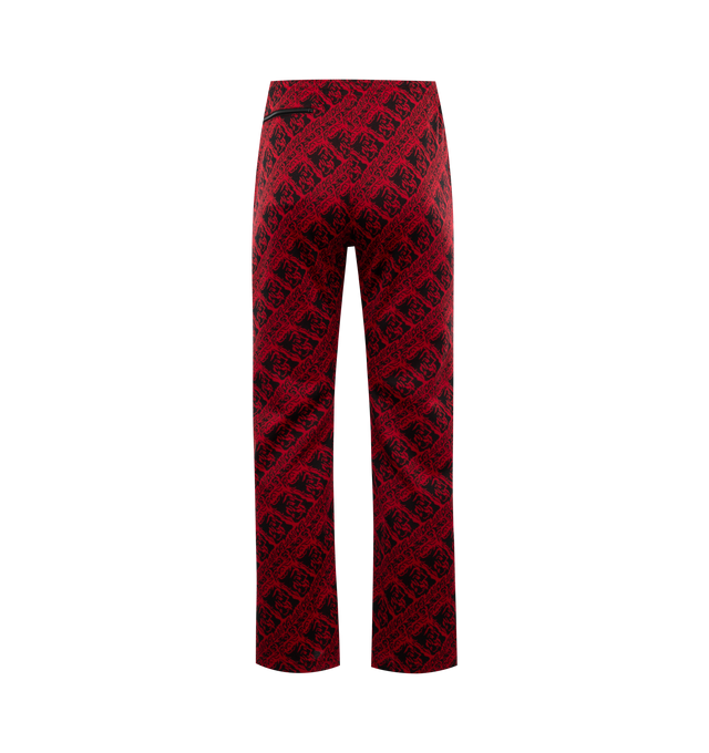 Image 2 of 3 - RED - NEEDLES Track Pant featuring jacquard graphic pattern throughout, concealed drawstring at elasticized waistband, three-pocket styling, zip pockets, logo embroidered at front, pinched seams at front and partial mesh lining. 100% polyester. Trim: 100% rayon. Made in Japan. 