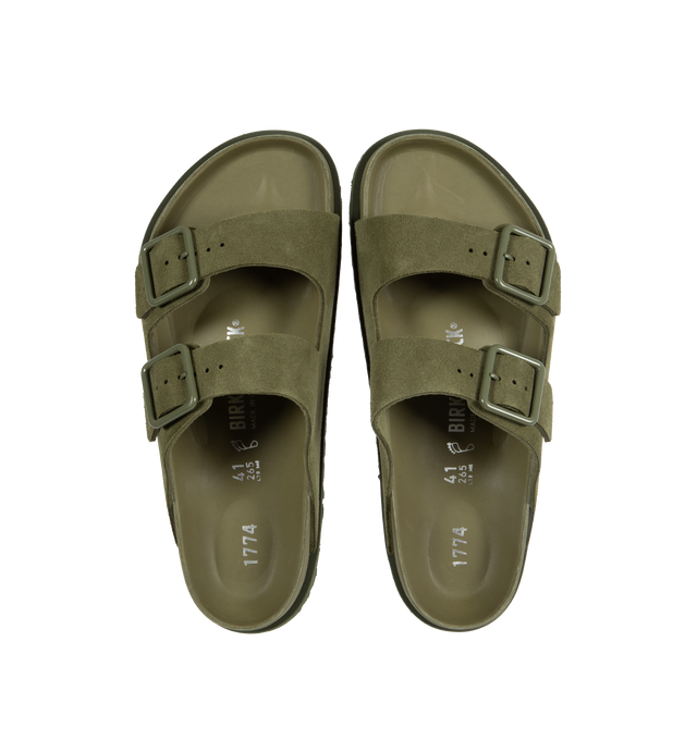 Image 4 of 4 - GREEN - Birkenstock's Arizona sandals in a regular width. The iconic Arizona sillhouette is  updated in suede featuring adjustable straps with buckle closures, logo details, shaped insole, and EVA outsole. Upper: Luxurious fine flesh out suede, a full grain leather that has been flipped to use the fuzzy side. Footbed: Anatomical shaped BIRKENSTOCK cork-latex footbed, covered with premium, color-matching smooth nappa leather. Sole: EVA outsole with a 3mm EVA welt updates the standard die-cut o 