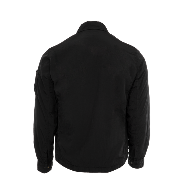 Image 2 of 3 - BLACK - C.P. COMPANY Chrome-R Lens Overshirt featuring classic collar, hidden two-way zip fastening with button closure, flap chest pocket, lens detail, adjustable flap cuffs, garment dyed, cotton lining and regular fit. 100% polyamide/nylon. 