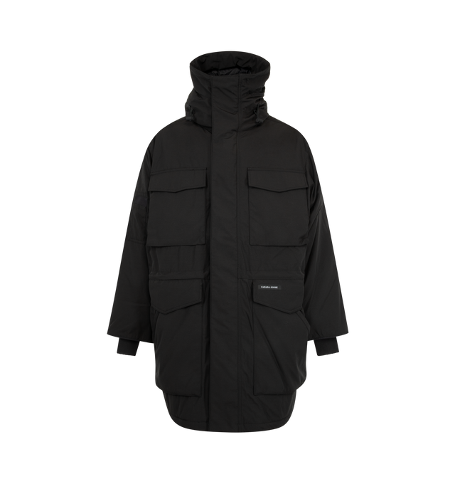 Image 2 of 4 - BLACK - Canada Goose Men's Erie Parka Tonal Disc is crafted from Recycled Organic Arctic Tech and features a heritage-inspired design engineered for extreme cold-weather conditions. Designed with an adjustable hood, fleece chin guard, and an interior drawcord waist, this down-filled parka delivers warmth, protection, and versatility. Functional details include four fleece-lined double-entry pockets, a sleeve pocket, one interior zippered security pocket, two interior drop-in pockets, elbow pa 