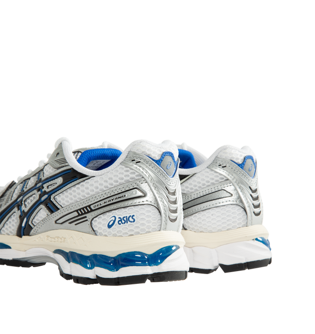 Image 3 of 5 - WHITE - Asics Unisex Gel-Kayano 12.1 Sneaker featuring breathable mesh underlays, GEL-NIMBUS17 tooling system, FLUIDRIDE technology, rearfoot and forefoot GEL technology and dope dyed recycled sockliner mesh.  