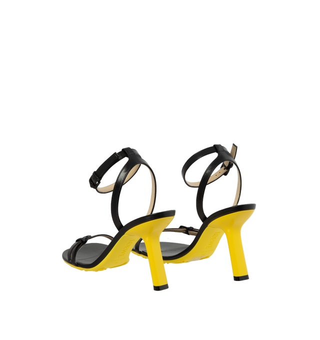 BLACK - LOEWE Petal Stiletto Sandals are a one-toe style with adjustable buckle and 3.5" heel. Leather sole. Made in Italy. 