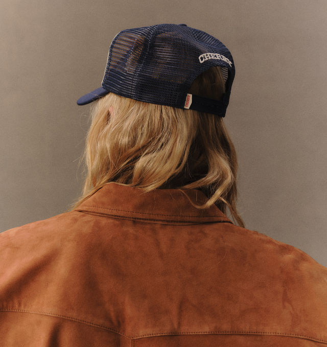 Image 7 of 7 - NAVY - Cherry LA Golden Eagle Trucker Hat is crafted from polyester and features a classic trucker silhouette with a screen-printed Golden Eagle graphic at the front and embroidered detailing at the back. Main Material: Polyester. Fit: Adjustable. Closure: Plastic Snapback Closure. Made in Los Angeles, California. 