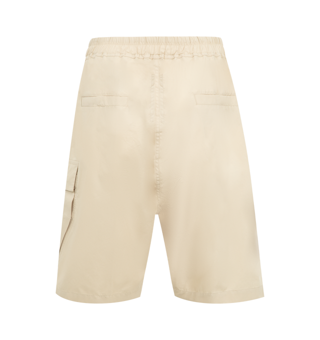 Image 2 of 3 - CHAMPAGNE - RICK OWENS Cargobela Shorts featuring a knee-length silhouette, low crotch, wide leg, exposed zipper and sleek beveled cargo pockets. 97% cotton, 3% elastane. Made in Italy.  