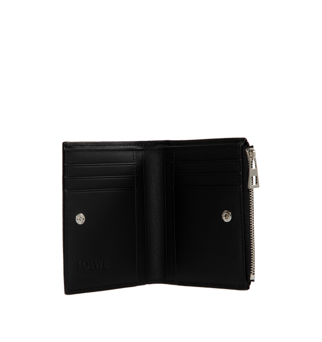 Image 3 of 3 - BLACK - LOEWE Slim Compact Walllet in textured classic calfskin featuring zip coin compartment, calfskin zip pull, embossed with a chevron pattern, snap button closure, six card slots, four slip pockets and one larger pocket for notes, calfskin lining and silver embossed LOEWE. Classic calf. 4.6 x 3.7 x 0.4 inches. Made in Spain. 