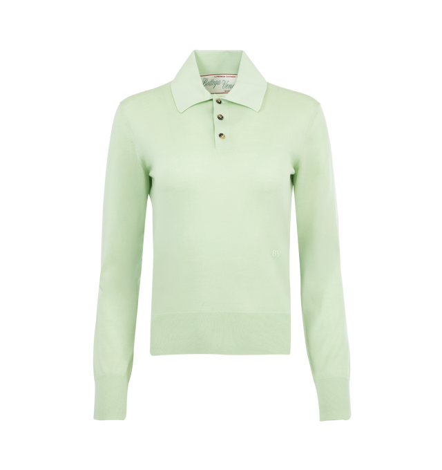 Image 1 of 2 - GREEN - BOTTEGA VENETA Light Fine Cashmere Polo featuring lightweight fine cashmere, long sleeves, polo collar, "BV" embroidery on the front and cropped fit. 100% cashmere. Made in Italy. 