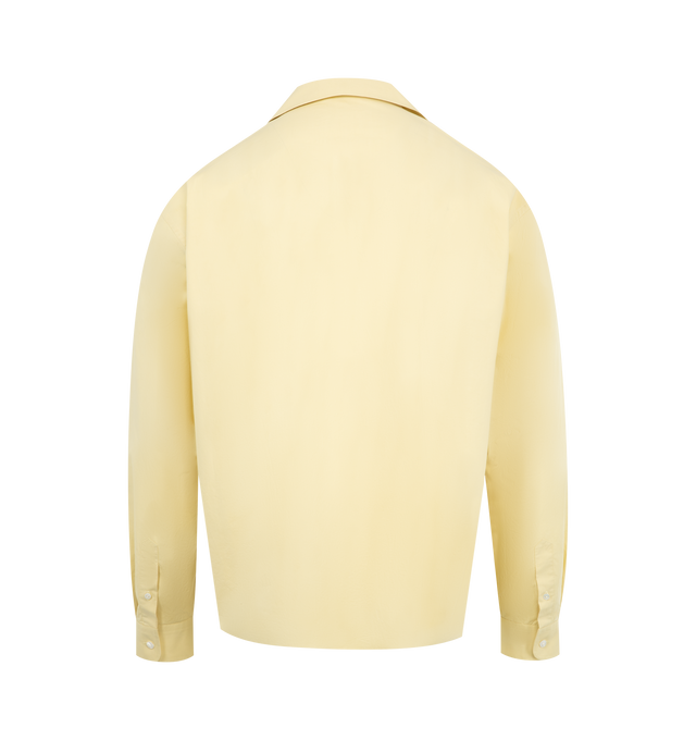 Image 2 of 2 - YELLOW - THE ROW Elijas Shirt featuring boxy button-up shirt in washed cotton poplin with front patch pocket and exposed horn button closure. 100% cotton. Made in Italy. 