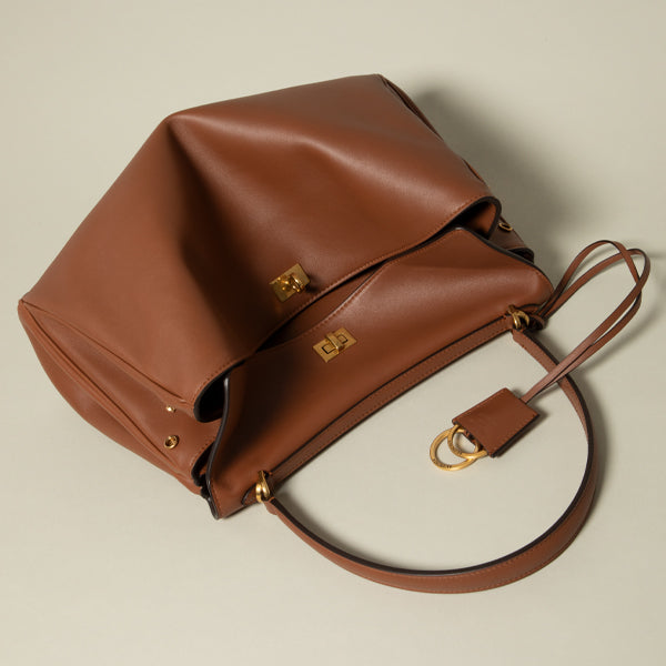 A brown leather balenciaga rodeo shoulder bag with gold-tone hardware