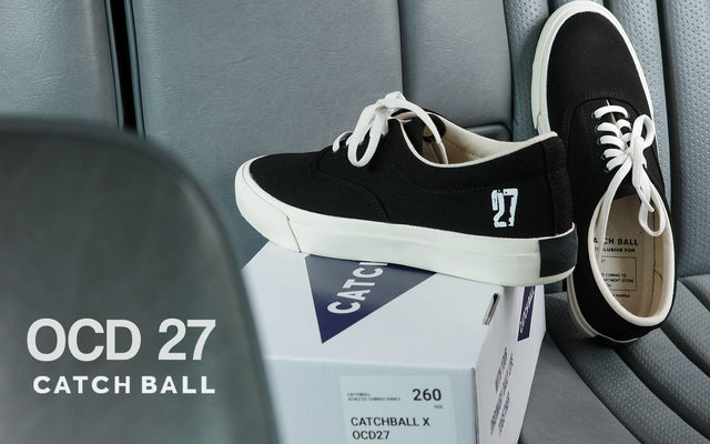 OCD 27 X Catchball Holiday black canvas sneakers with white shoelaces and details, shoe box and OCD 27 Catchball logo. Available exclusively at Hirshleifers.