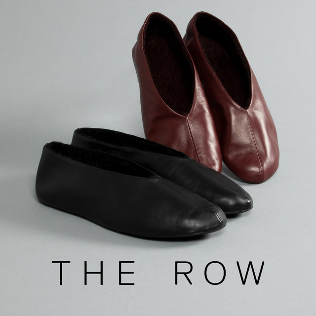 Two slip-on leather flats, one black and one burgundy, arranged on a light gray background with the text 'THE ROW' underneath. 