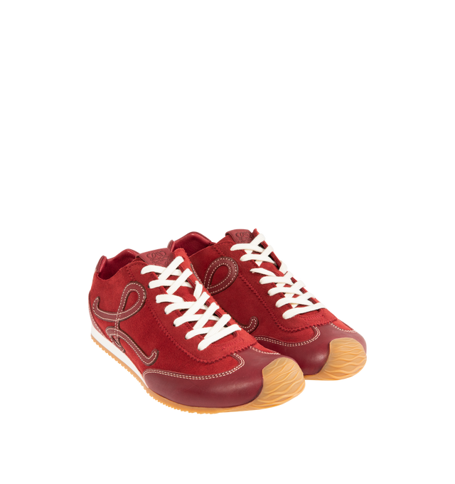 Image 2 of 5 - RED - LOEWE  Ballet Runner 2.0 Unlined Sneaker in deerskin and vegetable-tanned calfskin featuring an asymmetrical toe shape, an unlined sock-like internal structure, a lightweight textured outsole that extends to the toecap, 20mm heel, L monogram at the side, embossed Anagram on the tongue and embossed LOEWE on the heel tab. Deer/Classic Calf. Made in Italy. 