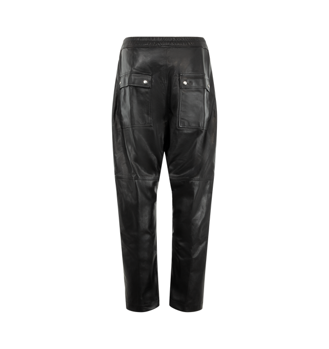 Image 2 of 3 - BLACK - Rick Owens Men's Bela Pants are crafted from lightweight waxed lamb leather and feature a loose-fit, full-length silhouette with a dropped crotch. Designed with an elasticized drawstring waistband, exposed zip Bela fly, side welt pockets, and back flap pockets with snap closures. Main Material: 100% lamb leather. Lining: 100% cupro.  