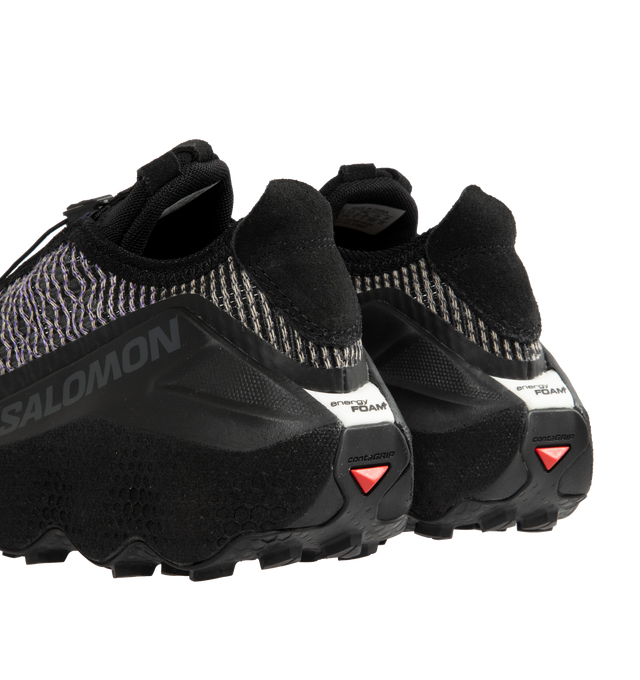 Image 3 of 5 - BLACK - Salomon Orava Advanced Unisex Sportstyle Shoes, drawing inspiration from the free curves of the Arve river, an elevated expression of the movement of nature. Featuring All-Terrain Contagrip rubber outsole with a distinctive, wavy geometry designed to diffuse pressure and to break down repeated underfoot impact for enhanced, durable comfort. OptiFOAM+ midsole, Quicklace lacing system and Matryx textile upper designed to resist abrasion with individually-coated high-tenacity Kevlar and  