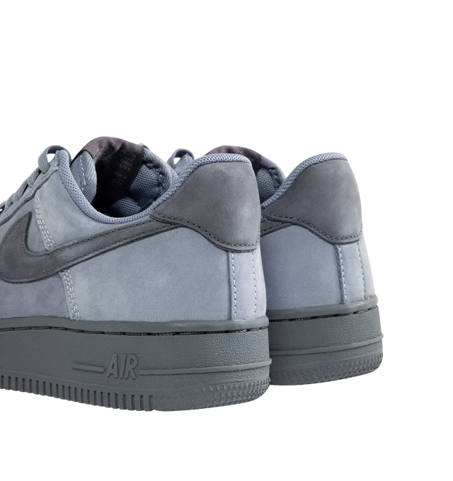 Image 3 of 5 - BLUE - NIKE Air Force 1 Low Retro Premium Sneaker featuring premium leather upper with perforated toe box, Nike Air technology and rubber outsole with heritage hoops pivot circles. 