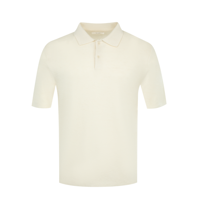 Image 1 of 2 - WHITE - THE ROW Ravi Top featuring short-sleeved polo top in silk, cashmere, and linen with classic fit and front button closure. 60% silk, 30% cashmere, 10% linen. Made in Italy. 