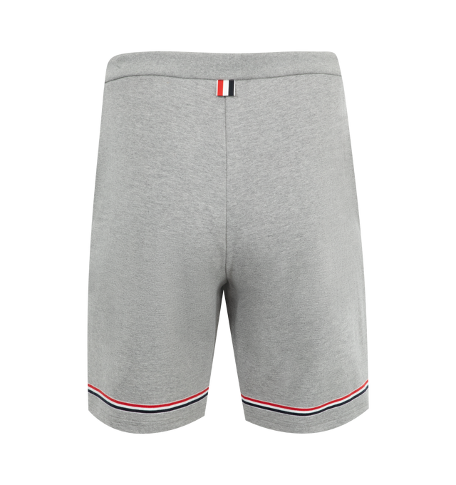 Image 2 of 3 - GREY - Thom Browne Interlocking RWB Stripe Mid Thigh Shorts have a drawstring waistband, side pockets, a signature grosgrain loop tab, and an interlocked RWB stripe. 100% cotton. Made in Japan.  