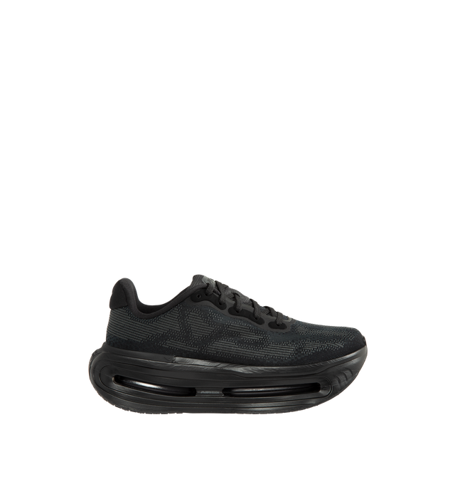 Image 1 of 5 - BLACK - Nike Vomero Premium SP "Skeleton" Sneakers feature Nike's most advanced everyday running platform, combining dual Air Zoom units with ultra-responsive ZoomX foam for exceptional cushioning and energy return. This special-edition "Skeleton" design is distinguished by reflective skeletal graphics that enhance visibility while delivering a bold, Halloween-inspired aesthetic. Engineered for comfort on daily runs and all-day wear, the silhouette balances maximum cushioning with a sleek 