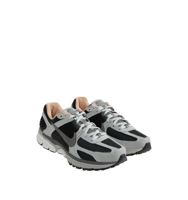 Image 2 of 5 - GREY - NIKE Zoom Vomero 5 Sneaker featuring real and synthetic leathers on upper, mesh panels and ventilation ports on heel, snappy and responsive, Air Zoom cushioning, plastic caging on side and rubber outsole. 