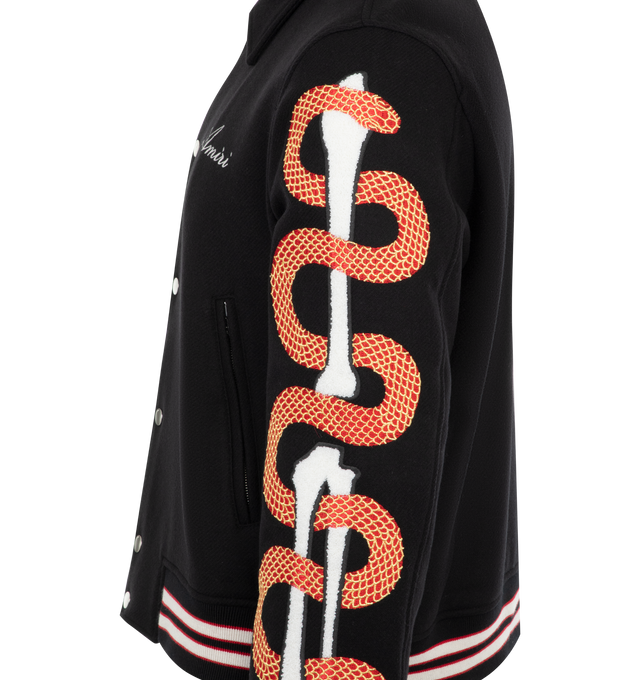 Image 3 of 3 - BLACK - Amiri Snake Bones Jacket has a relaxed fit with a classic collar, a pressed stud closure, embroidery at the sleeves, side pockets, branded hardware, and ribbed trims. Lined. Exterior 75% wool, 25% polyamide.  