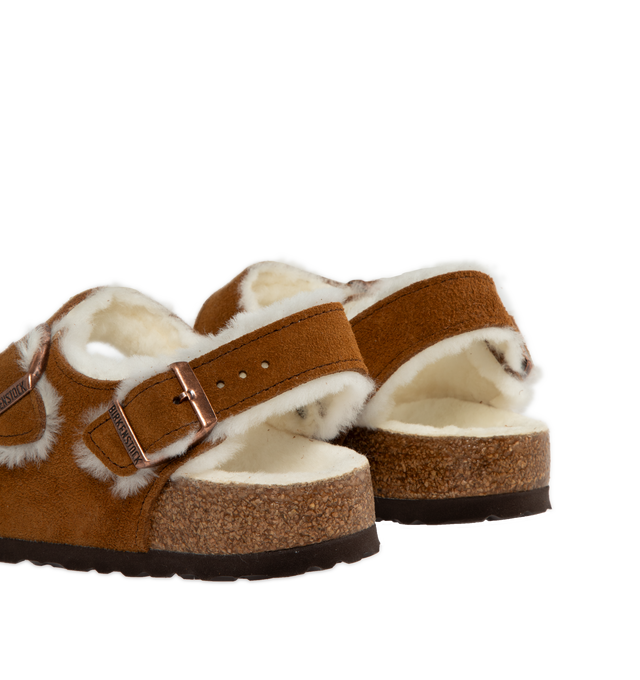 Image 3 of 4 - BROWN - BIRKENSTOCK Milano Shearling Suede Sandal featuring logo-engraved buckle, double-strap design, round open toe, buckle fastening front straps and slingback strap, shearling lining, moulded footbed and flat sole. Dyed real sheep fur. EVA sole. 
