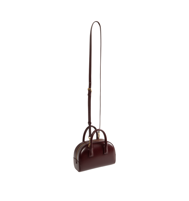 Image 2 of 3 - RED - Saint Laurent Womens Sac de Jour Mini Boston Bag is crafted from calfskin leather. Features top handles, adjustable and detachable shoulder strap, zip closure, leather lining, bronze-tone hardware, and two interior card slots. Dimensions: 19  13  7 cm; Handle Drop: 5 cm; Strap Drop: 45 cm. Main Material: Calfskin Leather; Hardware: Brass; Lining: Leather. Made in Italy. 